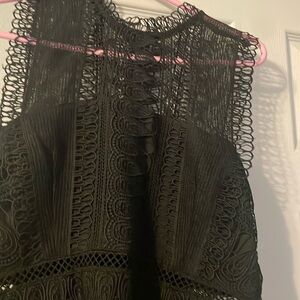 Woman’s size large formal dress. Black brand new with tags never worn .